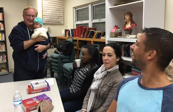 2016_RCIA_msgr_with_baby_in_class